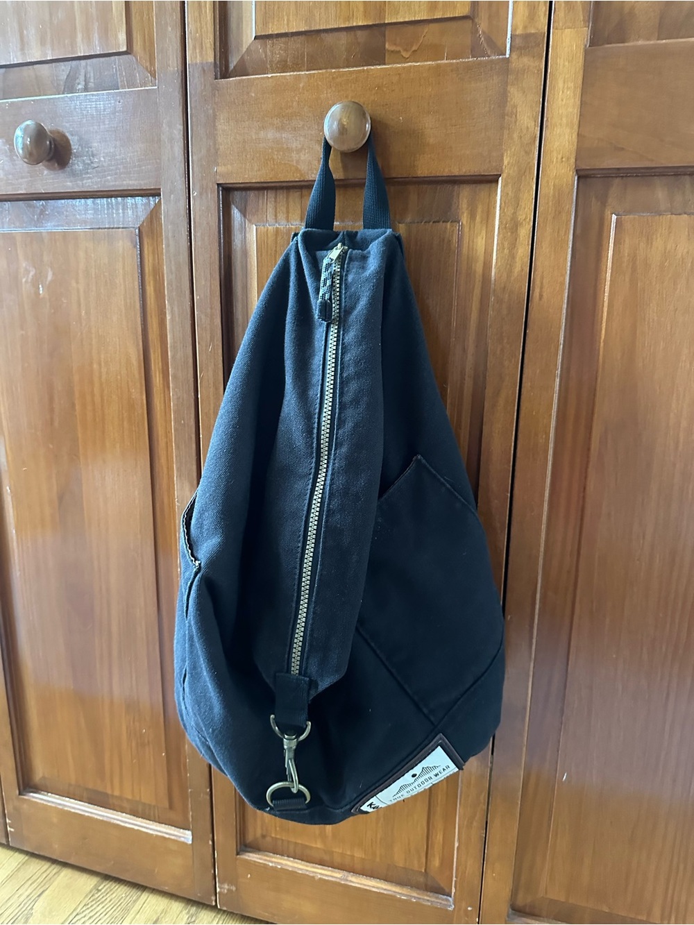 Kavu Black Sling Backpack true outdoor wear
